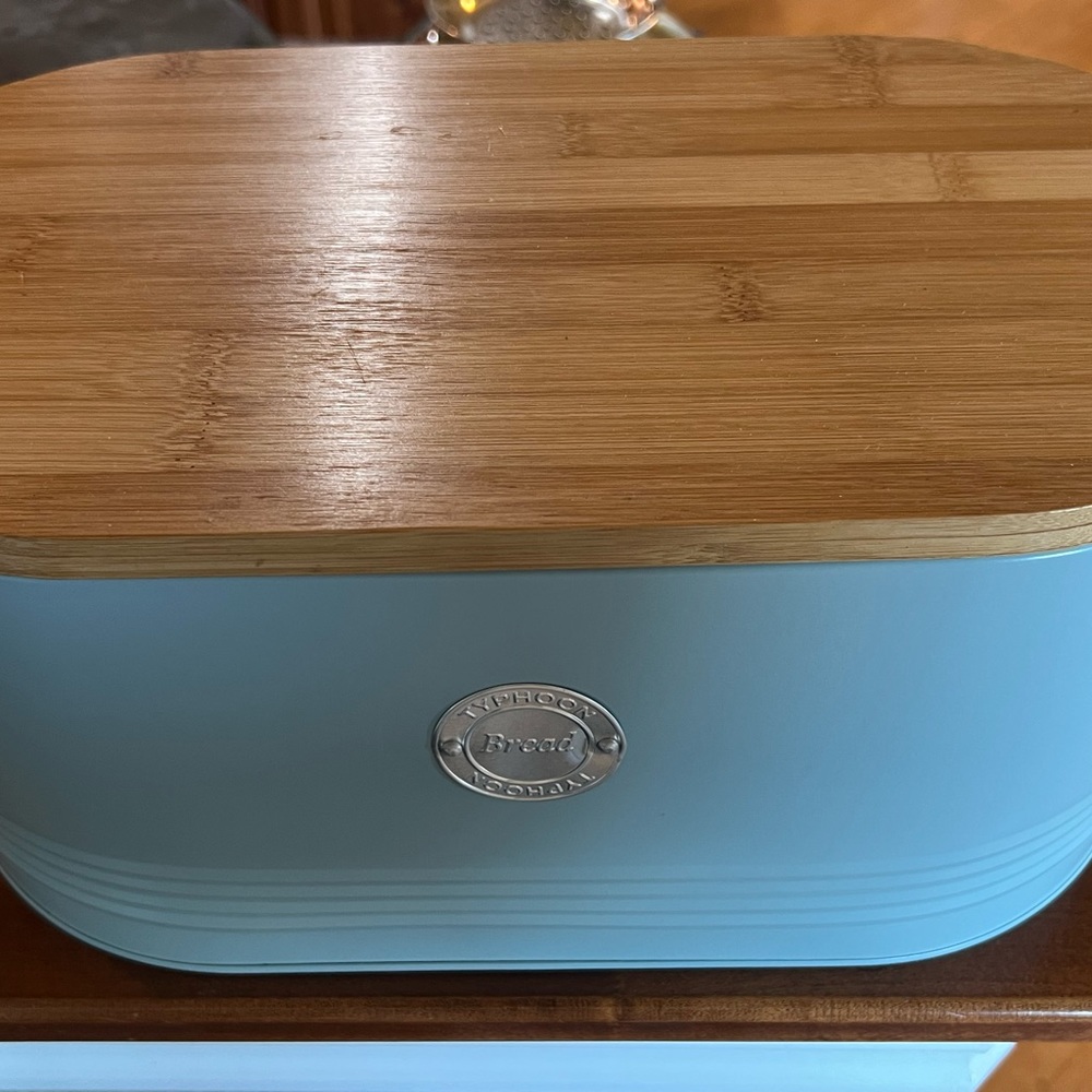 Teal bread box with wood board lid